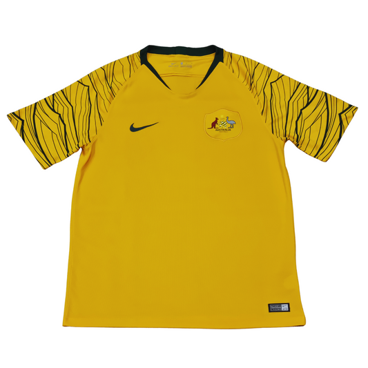 A yellow Nike soccer jersey with black stripes (Australia 2018 Home Jersey).