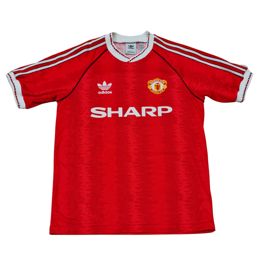 A Manchester United 1991/92 Home Jersey Re-release in red with white stripes, made by Adidas.