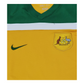 The Australia 2010 Home Jersey by Nike features a vibrant yellow and green color scheme, showcasing the iconic kangaroo emblem.