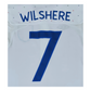 A white Umbro jersey with the number 7 on it, worn by Jack Wilshere during England's 2011 Home matches.